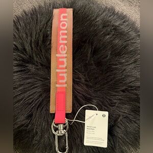 Lululemon Never Lost Keychain Brown and Orange Strap
